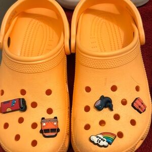 Bright orange crocs